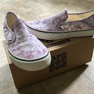 Light purple slip on vans.
